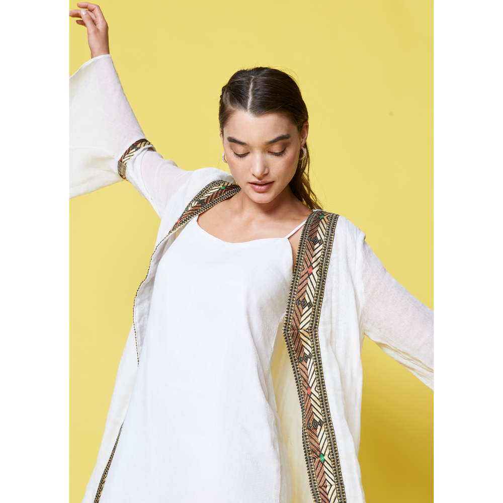 Embrace Fall's essence with our hand-woven Ease Cardigans - a celebration of artisanal craftsmanship. Crafted from organic cotton, these delicate cardigans offer comfort and sustainability akin to a precious pearl. The flared sleeves add an elegant touch, inviting graceful movements and a charming twirl. #BlackFridayFashion #EthiopianCraftsmanship #ArtisanalFashion #FallStyle #SustainableFashion #LimitedTimeOffers #GetItFirst #ShopSmart #UnbeatablePrices